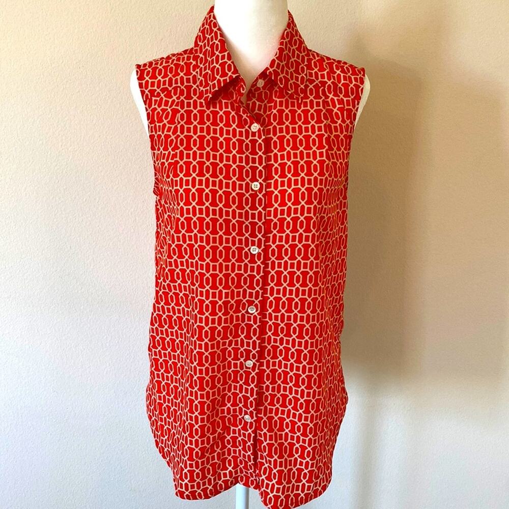 Orange and white geometric detail, blouse size small